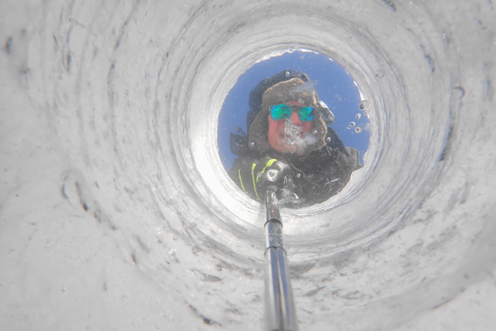 The top few inches is made of the lesser airy ice. Below that layer, the ice is clear and hard as rock.