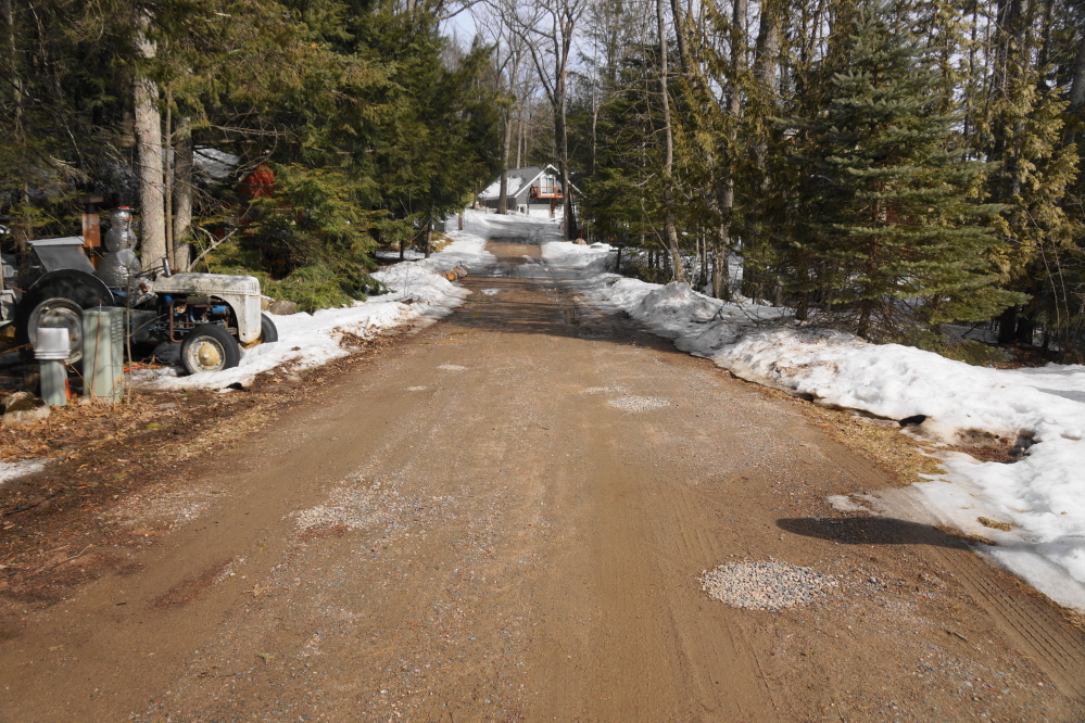 Knott Lane had lost its ice (mostly) and was ready for boat trailer traffic and pothole repair.