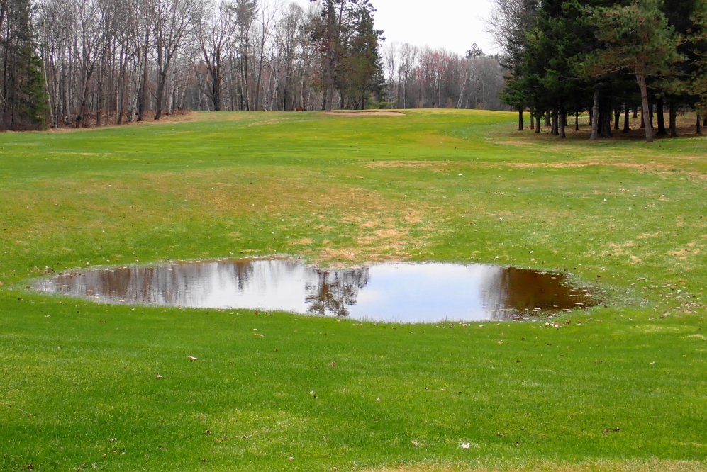 The rain and snow melt spawned a few new water hazards that should be gone in a week or three.