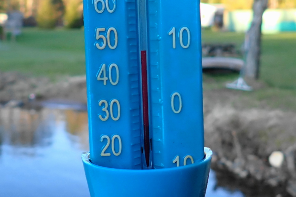 The brightness did not lift the lake temperature. The 46°F Sunday evening reading will push back that first ski run a day or two.