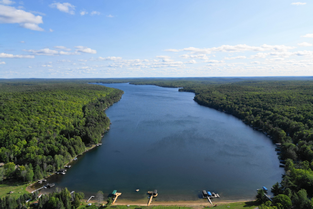 Last week could be best described as exhausting. By late Sunday, the surviving boats were pulled from the cold water of Lake Peshtigo, the spent drone batteries were on the charger, and many were ready for a nap. Congratulations to all the winners and survivors of this year's Footstock! And a special thanks to all the planners and volunteers that made this event possible. Despite the terror of flying a drone close to its limits, it was fun and many points were accumulated. In the next few weeks, there are plans to put up a special Footstock 2026 page to enshrine all the fun, excitement, and horror. It really depends on the weather. If the sun is out and the air is warm, it's hard to select, edit, and code a tribute page while on or under Lucerne.<br><br><br>-Nemo admired the carrots then quickly moved on.